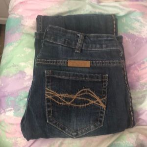 Dark pair of cowgirl tuff jeans